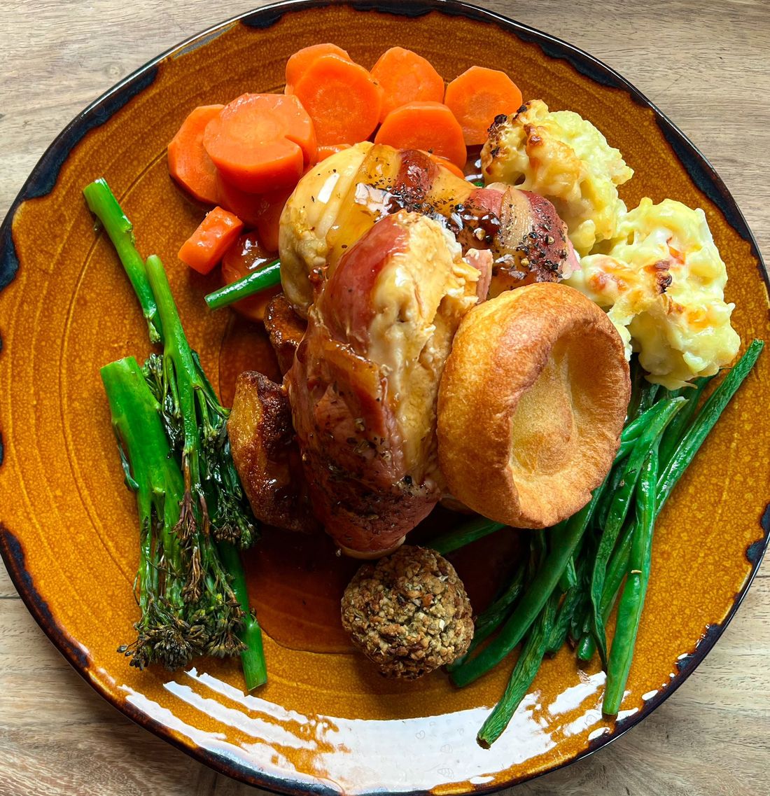 A Sunday roast at The Broad Oak with beef, Yorkshire pudding, roast potatoes, carrots and greens